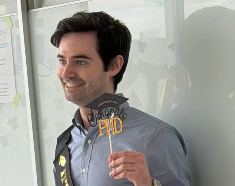 Ross showing off his new PhD!